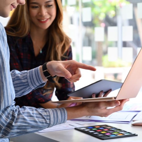 Team of graphic designer planning application process development prototype wireframe for web mobile phone. User experience concept.